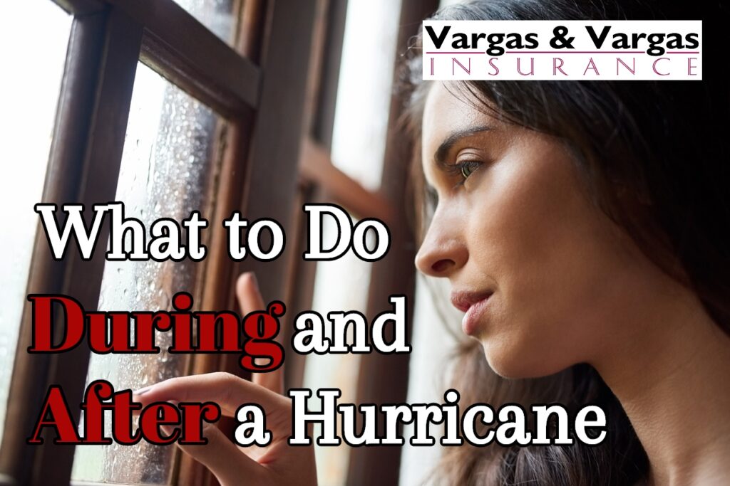 woman looking through the window at home as a hurricane approaches