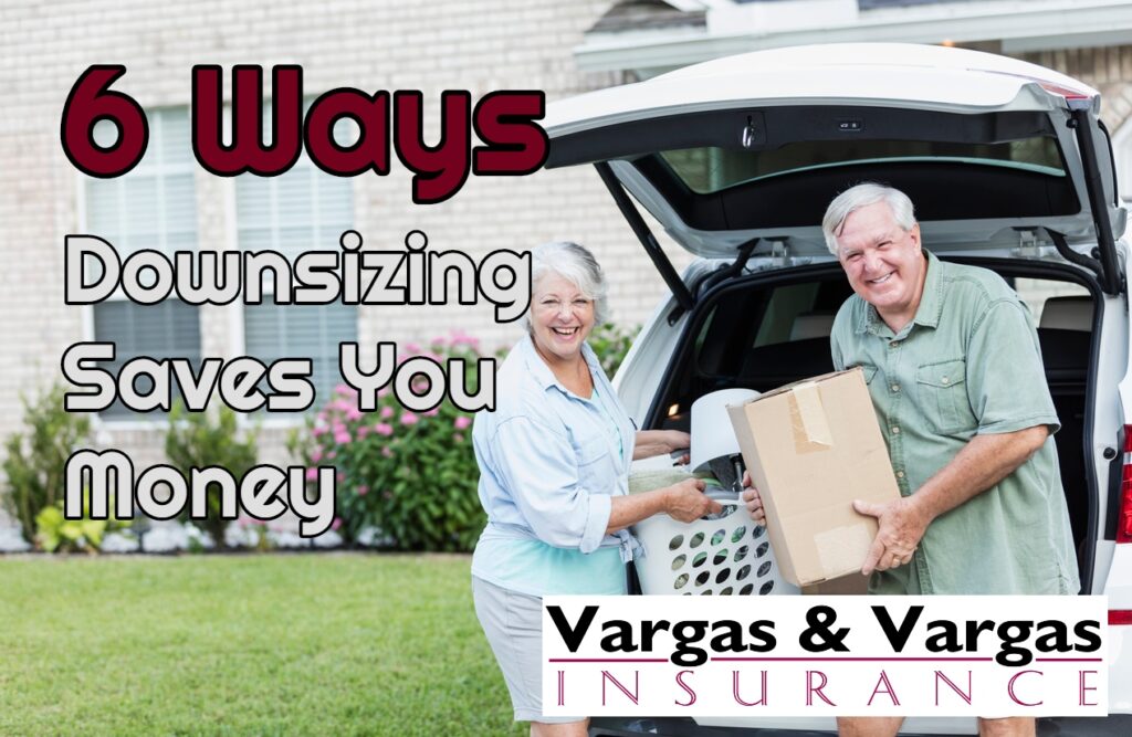 older couple unpacking in front of their new home while downsizing