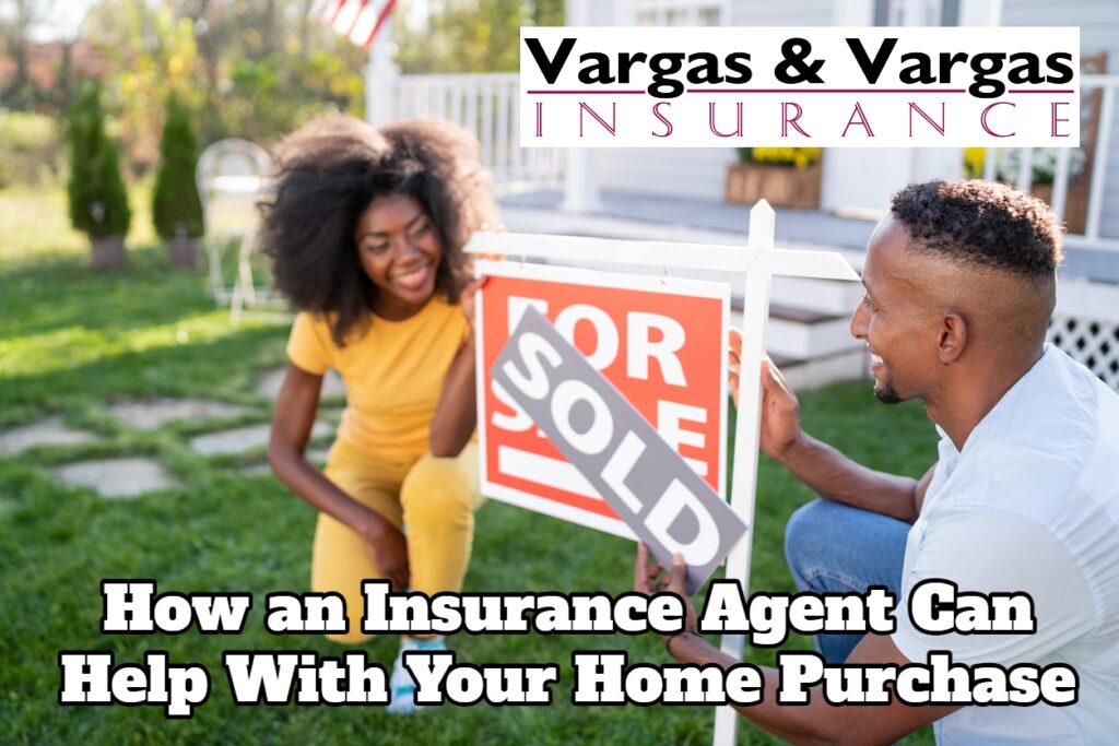 couple in front of their newly bought home